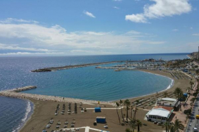 Seafront apartment with open-air heated pool